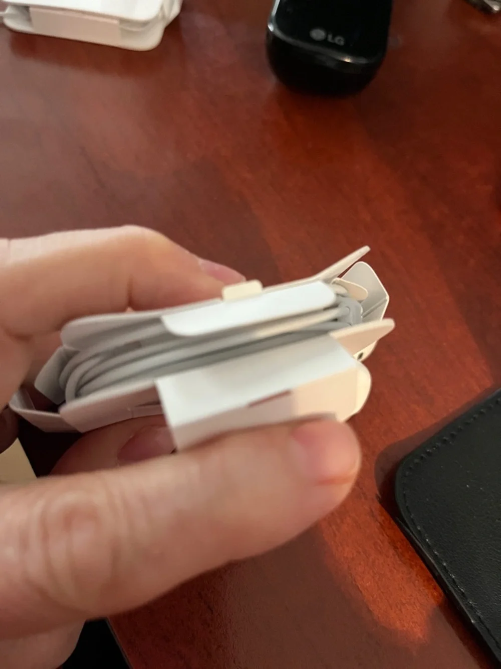 Apple White Wired Earbuds in Folded Card lightning connector